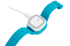 A charging kit with a USB cable inserted on the side, is plugged into a Spacetalk Kids watch